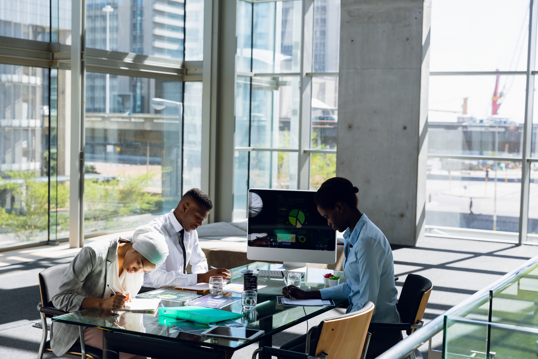 male-and-females-executives-working-together-at-de-2023-11-27-05-00-11-utc (1)